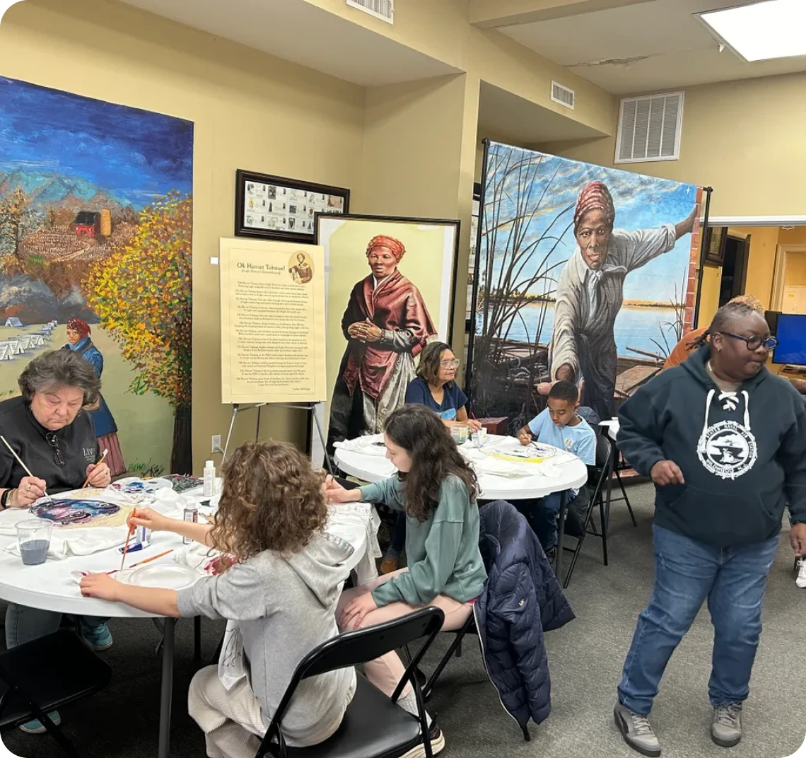 Art class with diverse participants painting